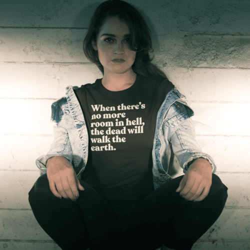 tshirt-mockup-of-a-handsome-female-model-crouching-at-night-20068-2-e1691175229359.png