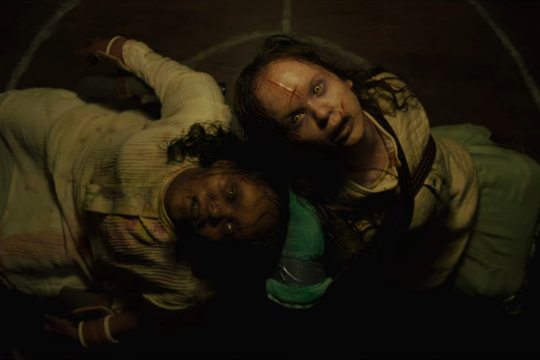 The Exorcist - Believer (2023) Possessed Angela And Katherine Are Tied To Chairs, Staring Up At The Ceiling With Evil Yellow Eyes, A Crucifix Carved Into The Foreheads.