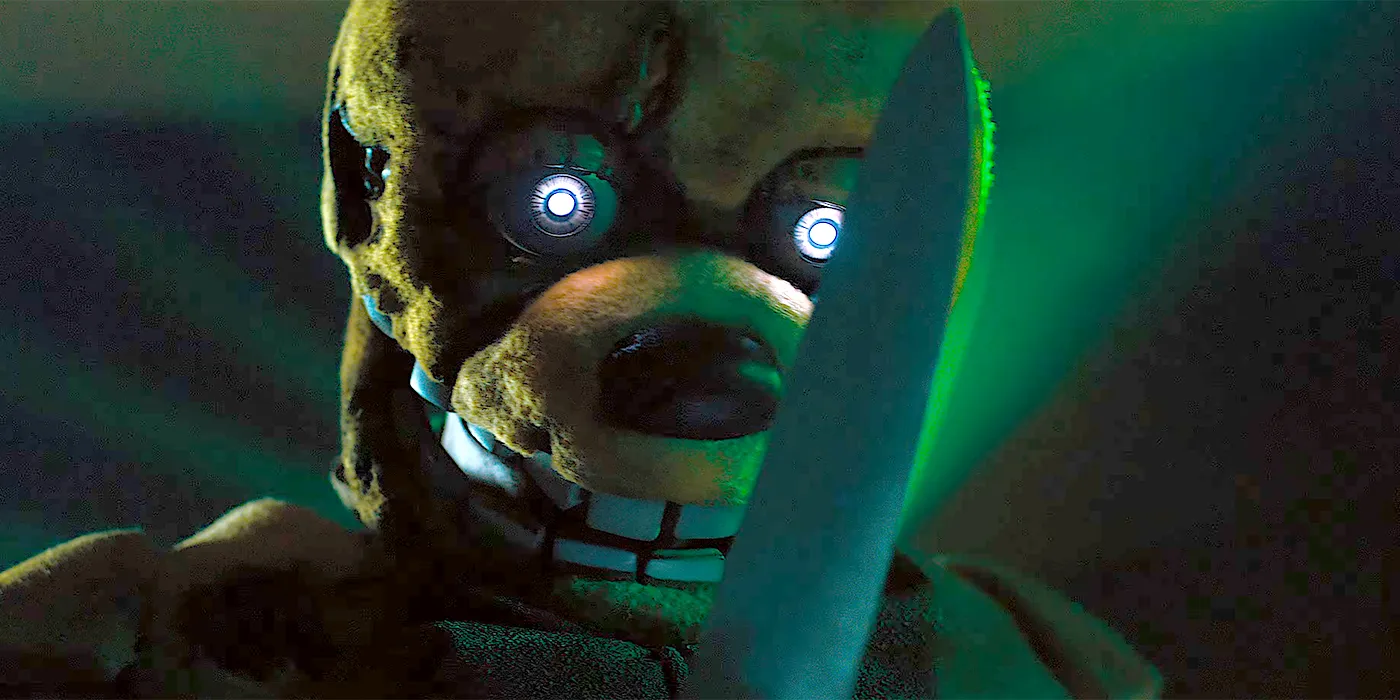 Five Nights At Freddy's (2023) An Evil Yellow Animatronic Rabbit with Glowing Robot Eyes Wields A Giant Sharp Butcher's Knife While Grinning Menacingly Under Green Arcade Lighting