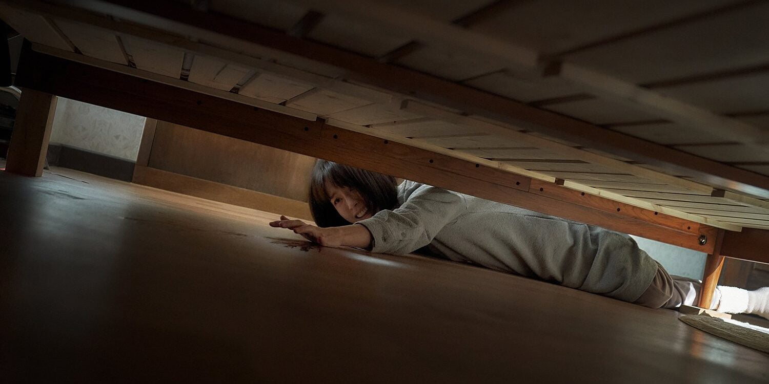 A Nervous Jung Yu-mi Reaches Under The Bed For Something In The Dark