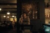 Inde Navarrette stars as Nikki and Michael Johnston as Bear in OBSESSION, a Focus Features release. Scene: Bear on The Phone While Nikki Watches Him Creepily in the Background